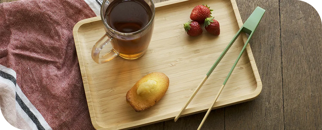 Tray with muffin and strawberries